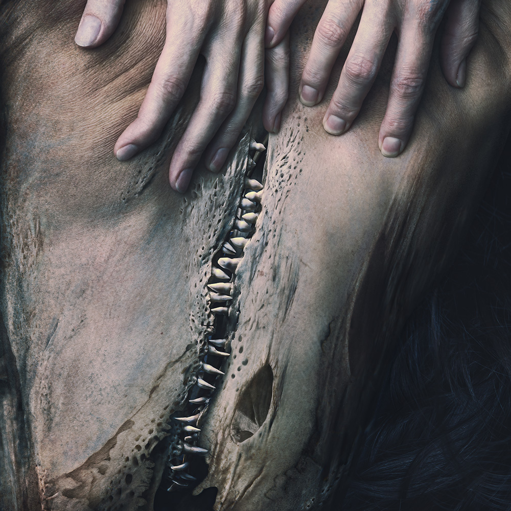 Self-portraiture of human body with nature pushing through from beneath the skin created by digital artist and bio surrealist Natalie Field